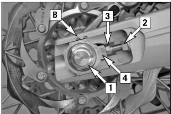KTM 125 SXS (2007) - Adapting the chain guide to the number of rear sprocket teeth NOTE: - 2