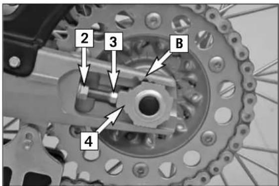 KTM 125 SXS (2007) - Adapting the chain guide to the number of rear sprocket teeth NOTE: - 3