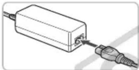 CANON PowerShot SD970 IS - Plug the cord into the coupler. - 1
