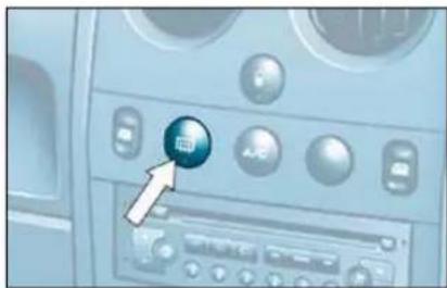 Control panel interface with a blue circular button labeled 'FTP' and an arrow pointing to it, indicating a specific connection point.
