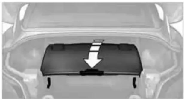 BMW Z4 sDrive30i Roadster (2009) - Folding down the cargo bay partition - 1