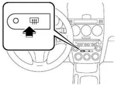 Diagram showing a car dashboard with a control panel and directional arrow, likely indicating left-hand rule or navigation.