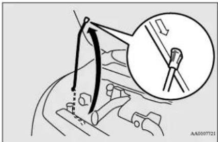 Diagram illustrating a mechanical assembly with labeled parts and an inset showing a tool interacting with a component.