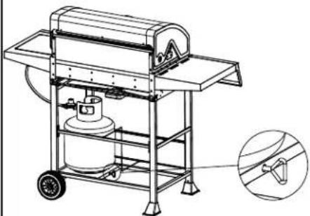 Technical line drawing of a mechanical device with wheels and a cylindrical component, showing internal components and a close-up inset (no text or symbols)