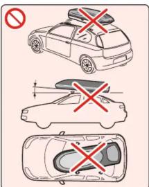 Diagram showing three car safety symbols: no sign, crossed-out cross, and crossed-out cross with a height indicator.