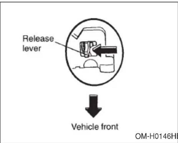 Release lever ↓ Vehicle front OM-H0146H