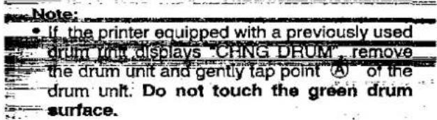 Note: • If the printer equipped with a previously used drum unit displays "CHNG DRUM", remove the drum unit and gently tap point Ⓐ of the drum unit. Do not touch the green drum surface.