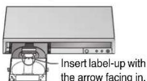 Insert label-up with the arrow facing in.