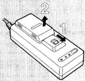 Technical diagram of a device with labeled parts 1 and 2, showing internal components and connections.