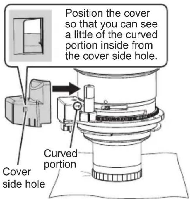 Position the cover so that you can see a little of the curved portion inside from the cover side hole. Cover side hole Curved portion