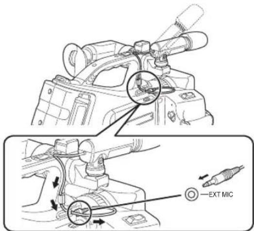 Technical diagram showing engine component assembly with labeled parts including EXT MIC and a circular annotation highlighting a specific component.