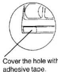 Cover the hole with adhesive tape.