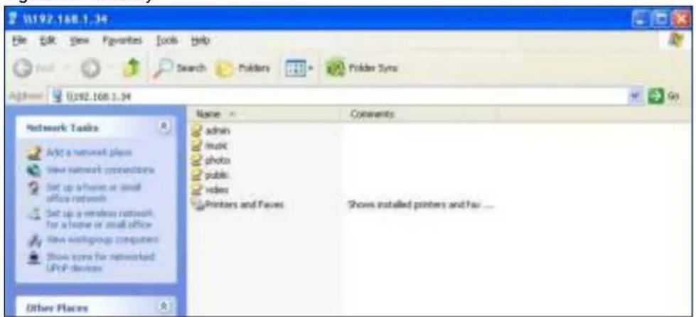 U192.168.1.34 File Edit View Favorites Tools Help Search Printers Picker Sym Address U192.168.1.34 Go Network Tasks Add a network play New network connections Set up a home or small office network Set up a wireless network for a home or small office New workgroups computers Show score for networked UPnP devices Other Places Name Comments admin music photo public video Printers and Faces Shows installed printers and has ....