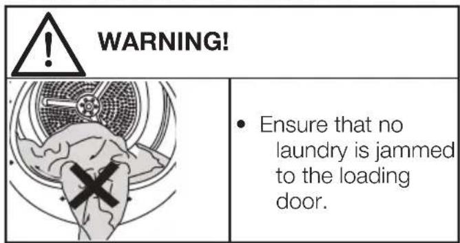WARNING! • Ensure that no laundry is jammed to the loading door.