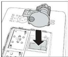 Diagram showing a device with a magnified view and a downward arrow indicating process or operation.