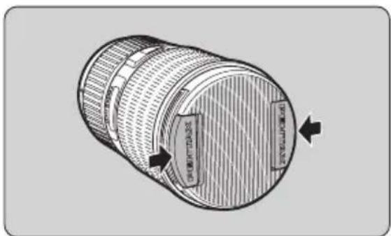 Technical diagram of a cylindrical device with labeled components and directional arrows indicating flow or movement.