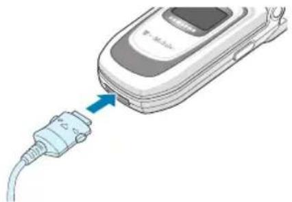 SAMSUNG SGH-Z105M - Akku mit dem Reiseadapter laden - 1