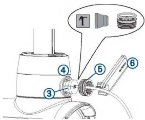 Technical diagram of a mechanical device with numbered components and a speech bubble indicating a speaker icon.
