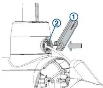 Technical diagram showing a mechanical device with labeled parts ① and ②, likely illustrating a machining or assembly process.