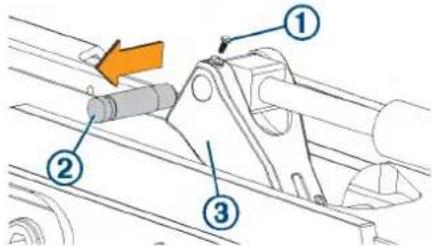 Technical diagram showing mechanical assembly with numbered components and an orange arrow indicating direction
