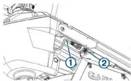 Technical diagram showing mechanical components with numbered labels 1 and 2, likely indicating parts of a device or assembly.