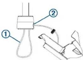 Diagram showing two labeled components of a mechanical or electrical device, with numbered annotations pointing to their respective parts.