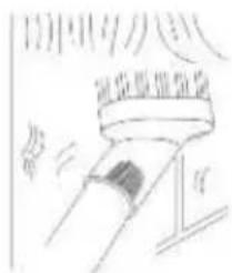 Hand-drawn sketch showing a hand pressing down on a surface with Chinese text above and below, possibly indicating a mechanical or architectural component.