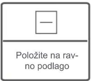 - Položite na rav- no podlago