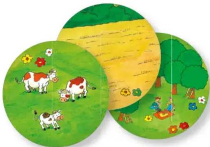 Illustration of three colorful circular panels showing cows in a green field with flowers and trees, and a yellow barn in the background (no text or symbols)
