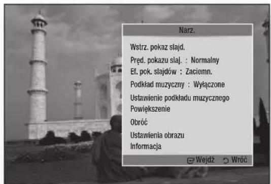 Narz. Wstrz. pokaz slajd. Pręd. pokazu sląj. : Normalny Ef. pok. slajdów : Zaciemn. Podkład muzyczny : Wyłączone Ustawienie podkładu muzycznego Powiększenie Obróć Ustawienia obrazu Informacja © Wejdź © Wróć