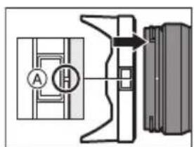 Technical diagram showing a mechanical assembly with labeled components and an arrow indicating direction or force.