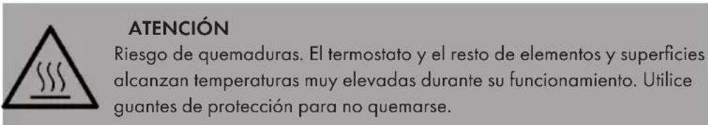 ATENCIÓN Riesgo de quemaduras. El termostato y el resto de elementos y superficies alcanzan temperaturas muy elevadas durante su funcionamiento. Utilice guantes de protección para no quemarse.