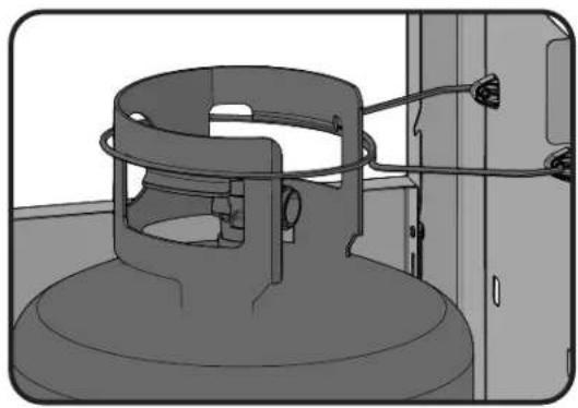 Technical illustration of a mechanical device with a coiled spring and attached housing (no text or symbols)