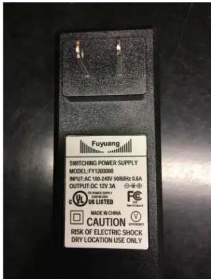 Fuyuang SWITCHING POWER SUPPLY MODEL:FY1203000 INPUT:AC 100-240V 5068Hz 0.6A OUTPUT:DC 12V 3A C VL US LISTED FE New C Class B MADE IN CHINA CAUTION RISK OF ELECTRIC SHOCK DRY LOCATION USE ONLY