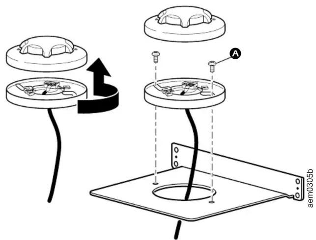 Diagram illustrating a mechanical assembly with labeled components and directional arrows, including a circular component with internal features and a mounting bracket.