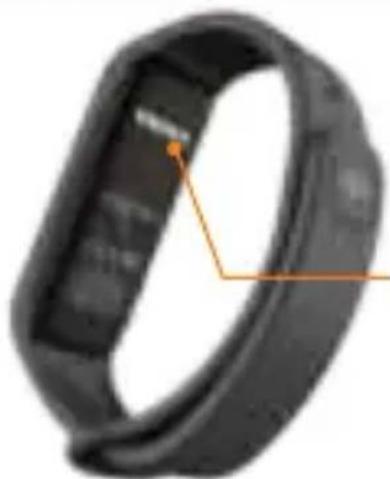 Close-up of a black wristband with orange annotation lines pointing to specific areas (no text or symbols visible)