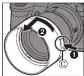 Diagram of a camera lens assembly with labeled parts and directional arrows indicating components