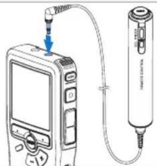 Diagram showing a device connected to a handheld device with labeled ports and a blue arrow indicating direction of connection.