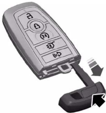 Diagram of a car key with labeled buttons and a USB port, showing a switch mechanism.
