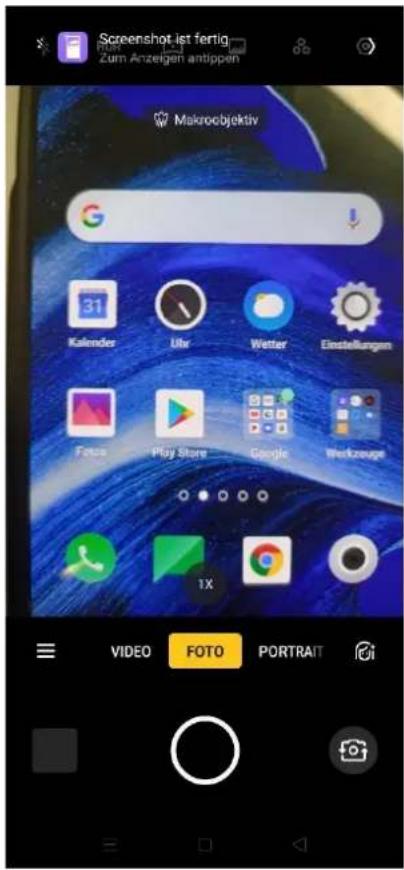 Screenshot ist fertig Zum Anzeigen antippen Makroobjektiv 31 Kalendar Uhr Wetter Einstellungen Facts Play Store Google Workzeuge 1X VIDEO FOTO PORTRAIT