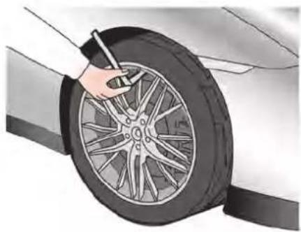Illustration of a car tire being adjusted for a hand using a tool (no text or symbols visible)