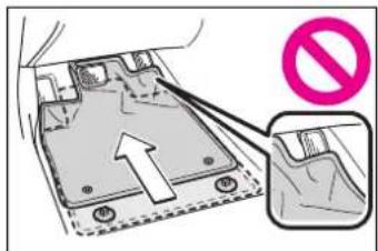 Diagram showing a device with an upward arrow and a prohibition symbol, indicating no movement or restriction.