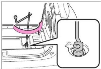 Technical diagram showing mechanical assembly with highlighted curved component and magnified detail view