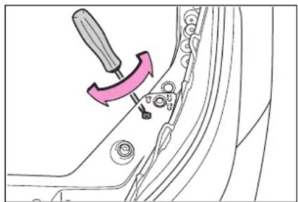 Technical diagram showing a screwdriver inserted into a car body with a pink arrow indicating the direction of movement.