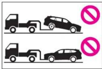 Diagram showing two heavy-duty trucks with no parking sign symbols, indicating no parking restrictions.