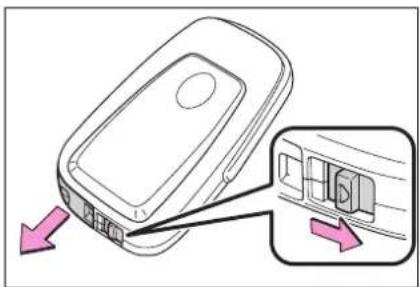 Diagram showing a device with labeled ports and directional arrows indicating movement or assembly.