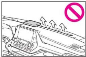 Diagram showing a vehicle front panel with directional arrows and a no-smoking symbol, indicating traffic flow or safety warning.