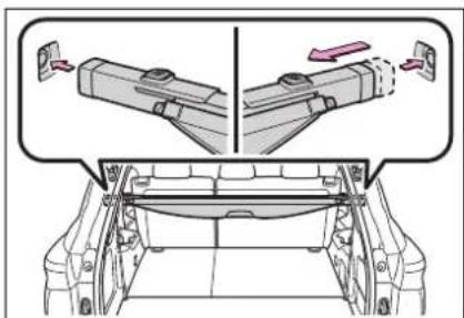 Diagram showing mechanical assembly with labeled parts and directional arrows indicating motion or movement