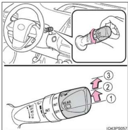 Diagram showing car interior control panel with labeled buttons and directional arrows, including a close-up of the component being inserted.
