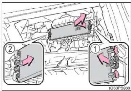 Diagram showing vehicle engine components with numbered parts and directional arrows indicating flow or movement
